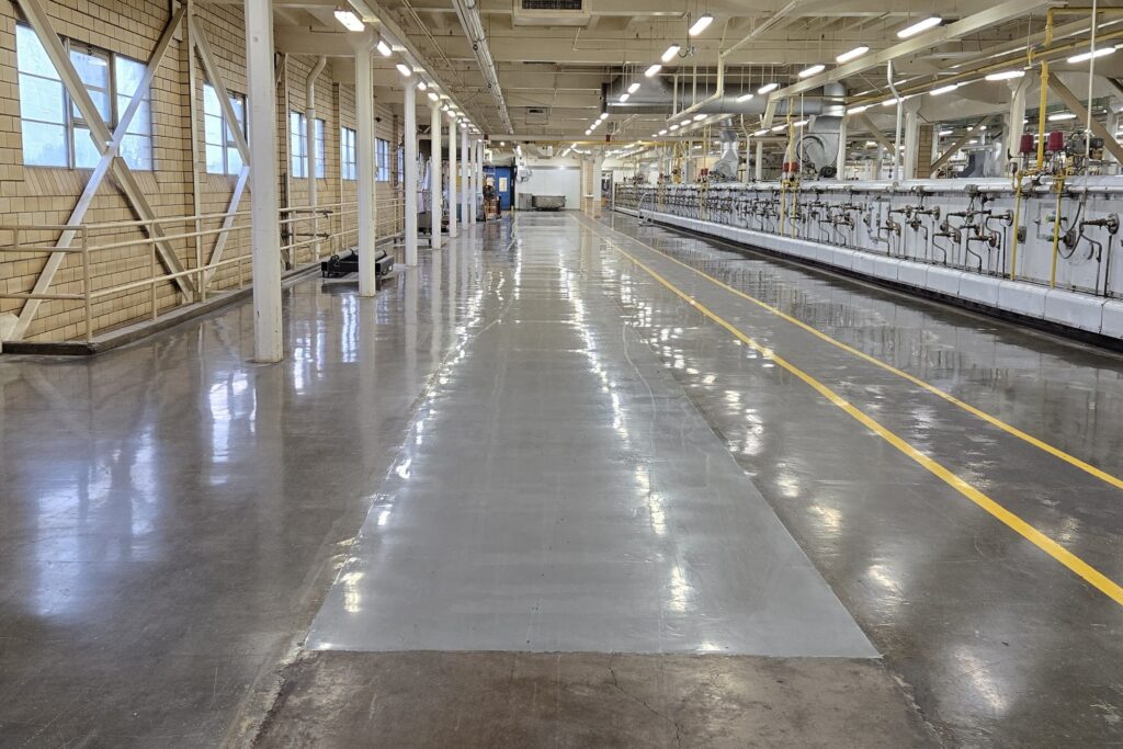 Finished view of the production floor after ovens were removed and new flooring was laid.